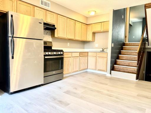New Quartz counter tops, cabinets, flooring and ceiling fan!