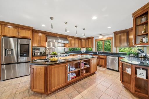 This stunning and well-appointed kitchen is truly a showstopper. We feel confident this lovely space may be just what you need to take your cooking to a next-level, top-chef experience!
