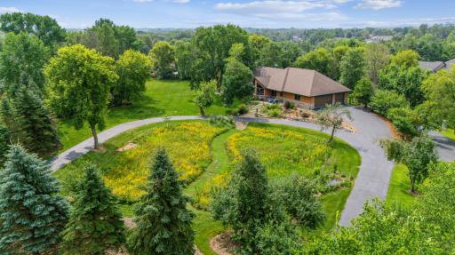 You will feel sky-high as you imagine becoming the new owner of this truly stunning home. A beautifully updated property surrounded by lovingly landscaped grounds!