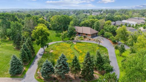 Aerial view of front of home facing south.