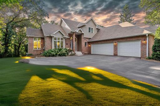 Attractive with L-shape side load 3 car plus garage on Cul de sac lot