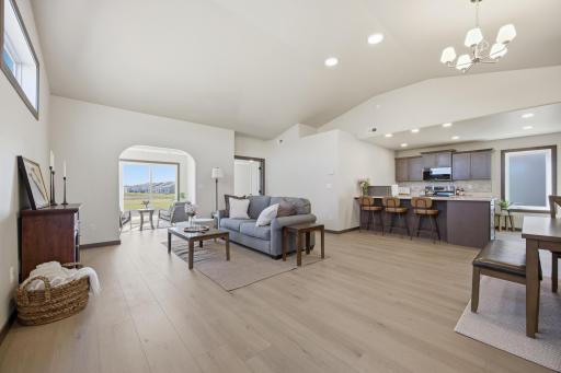 Welcoming and open floorplan with minimal flooring transitions and 36"+ door widths throughout.