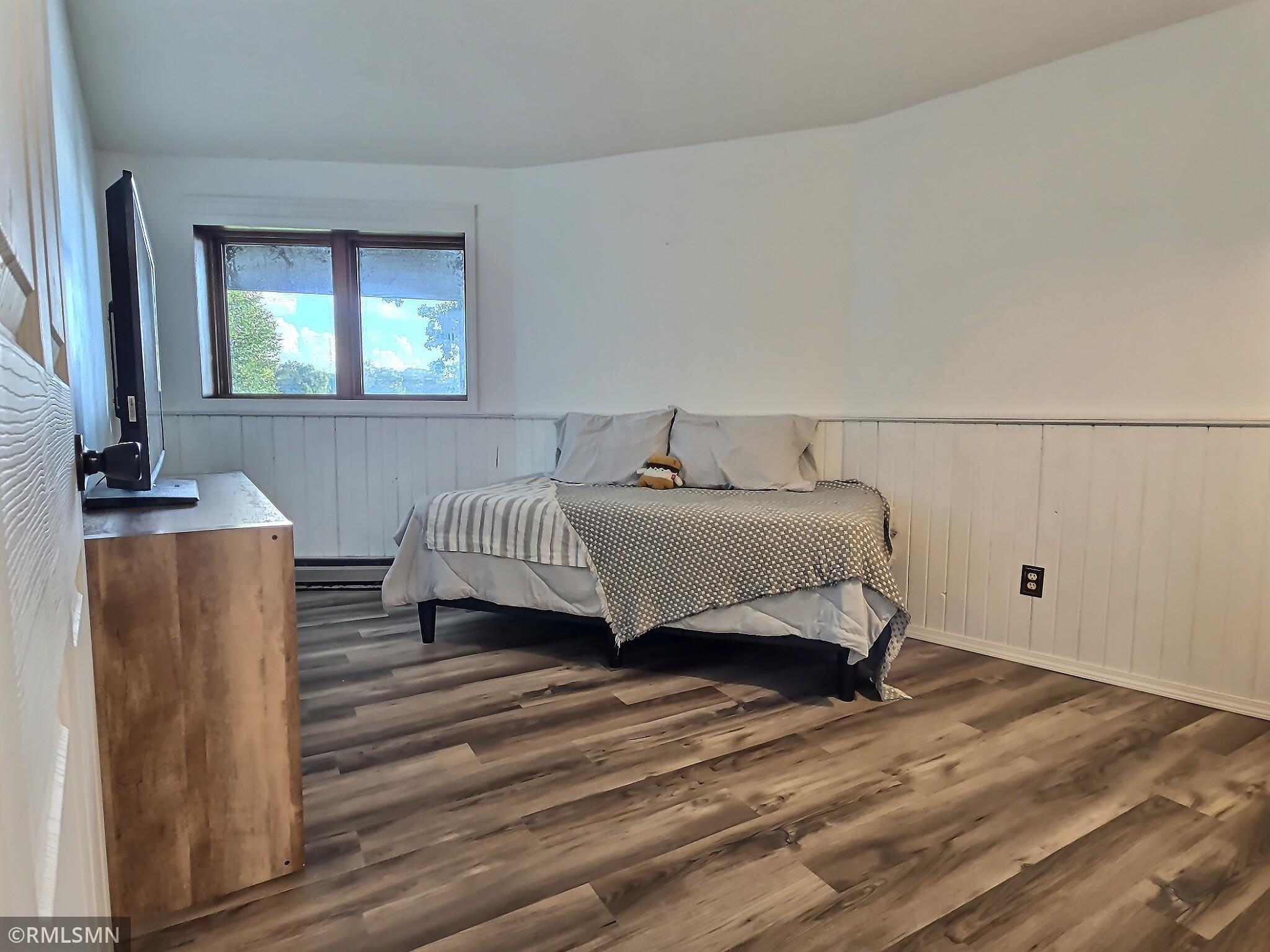 Bedroom two with window facing the lake