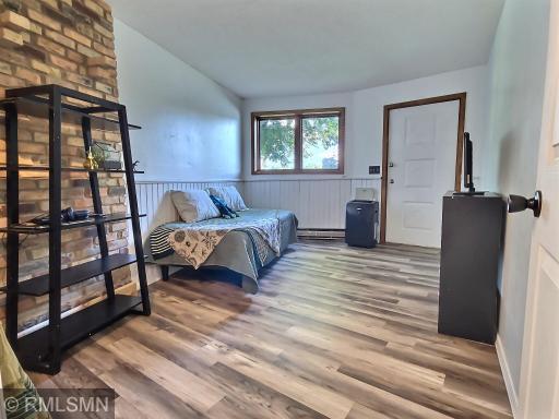 3rd bedroom with access door to lower level patio
