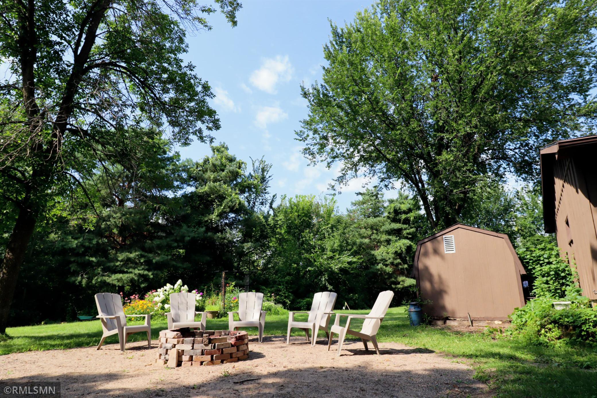 Multiple firepits on the property, did I mention this property spans 1.57 acres!