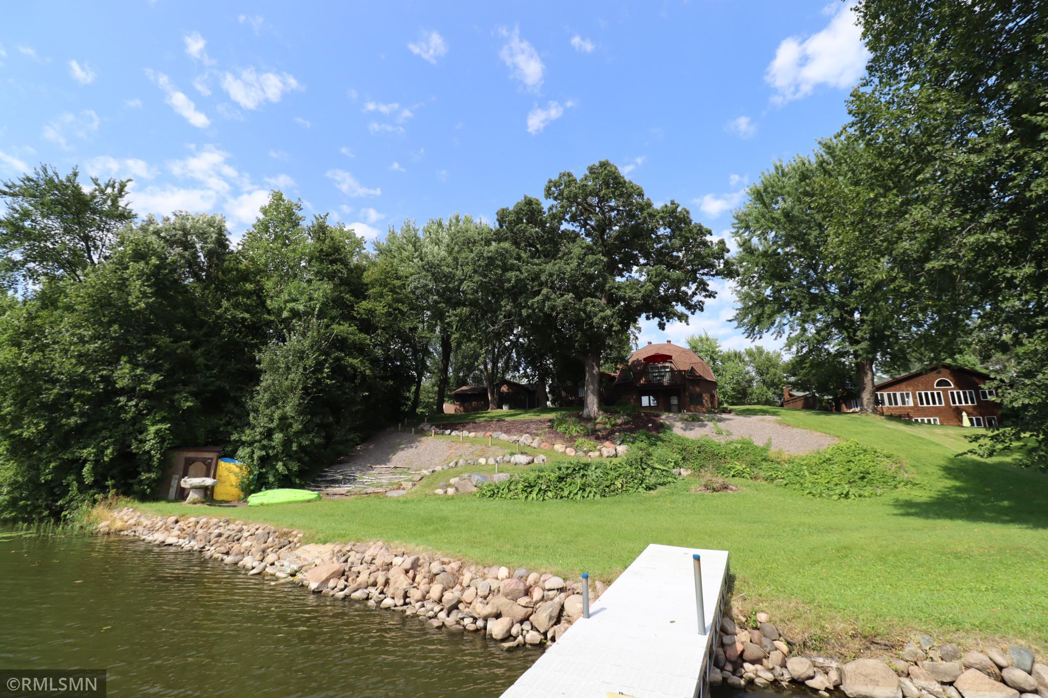 Look back from the dock at the shoreline, home and landscaping