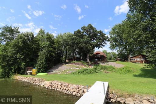 Look back from the dock at the shoreline, home and landscaping