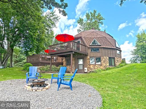 Welcome to Mink Lake! This unique Geodesic style home sits on a huge 1.57 acre lot.