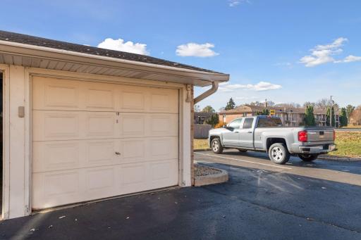 1 Car Detached Garage w/Door Opener & Another 1 Car Open Parking Spot.