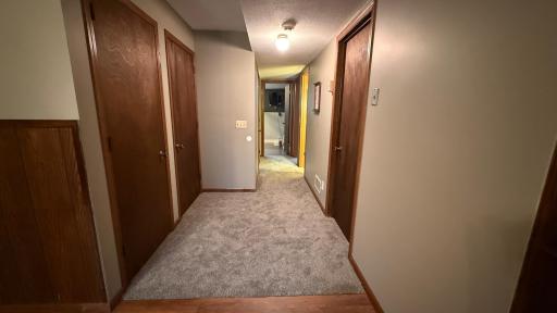 Lower Level Hallway to 3 Bedrooms