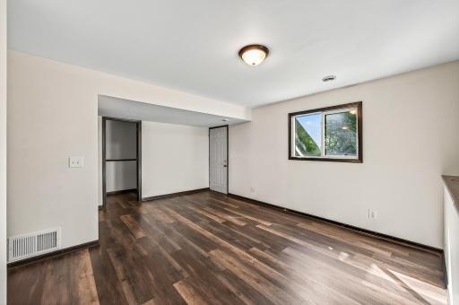 Downstairs, you will find a spacious lower level family room and great oversized storage closet near the walkout!