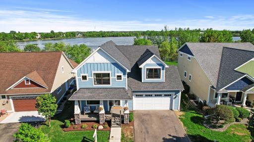 6644 Lamplight Drive | Albertville - Front covered deck adds extended living outdoor space.
