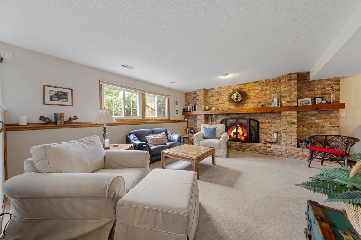 LL Family room with wood burning fireplace