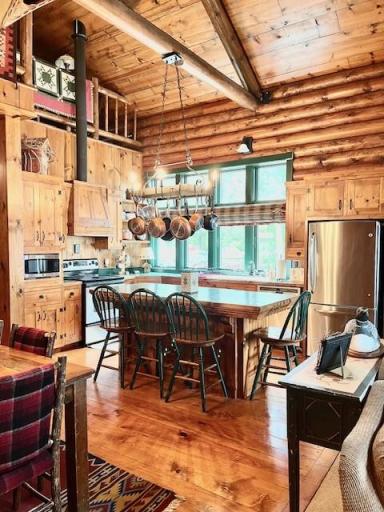 Another view looking across the kitchen. Notice the gorgeous hardwood floors