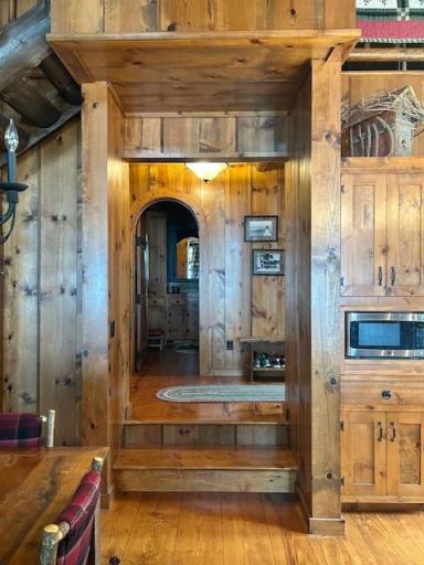 Beautiful use of wood and custom rounded doorways