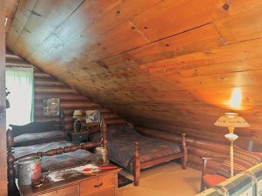 Upper level loft is divided and can sleep any number of people