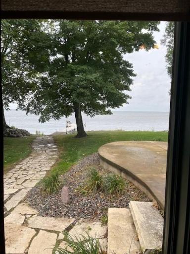 stone walkway from the cabin to the dock on the lake