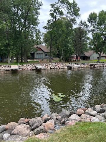 This property is adjacent to a very private harbor, and does include one dock/slip on this harbor. This is looking across the harbor to the cabin and showing one of the slips