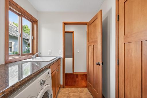 Laundry room with sink and closet storage!