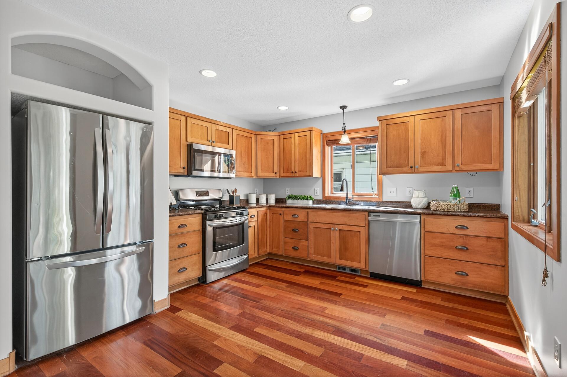 Large kitchen with stainless steel appliances