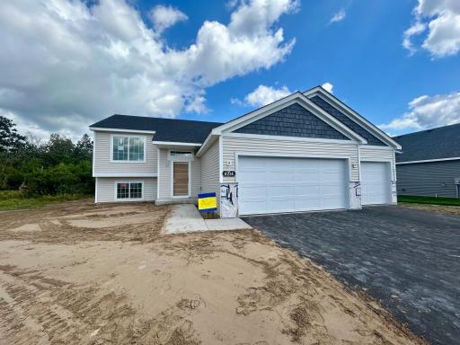 6714 Granby St, North Branch. Sod and Irrigation are Included and to be Installed.