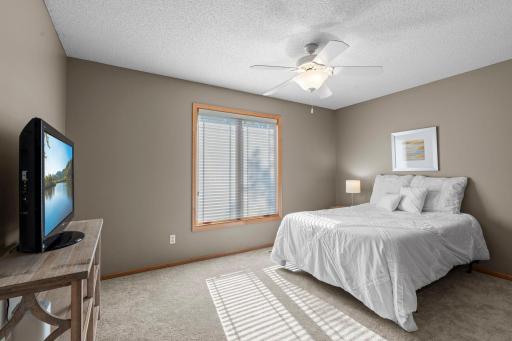 Upstairs, three bedrooms each include new carpet and ceiling fans.