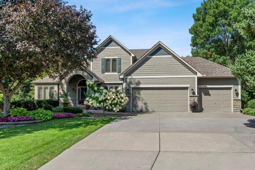Tucked away on a quiet cul-de-sac in the heart of Maple Grove, this beautifully maintained five-bedroom, four-bathroom home offers nearly 3,800 square feet of refined, functional living space with a serene wetland backdrop.