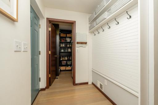 Back door entry with wall locker and views into your pantry