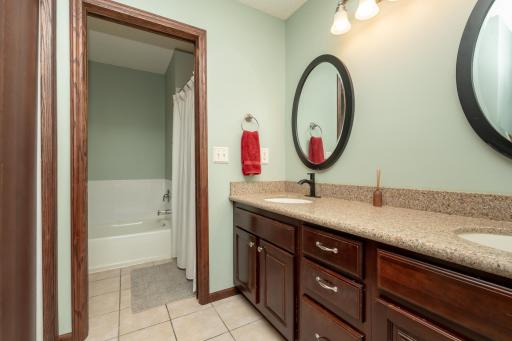 Upper level full bathroom with separate tub and shower