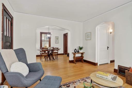Hallway to the right leads to main-floor bath and bedroom and stairwell to upper level bed.