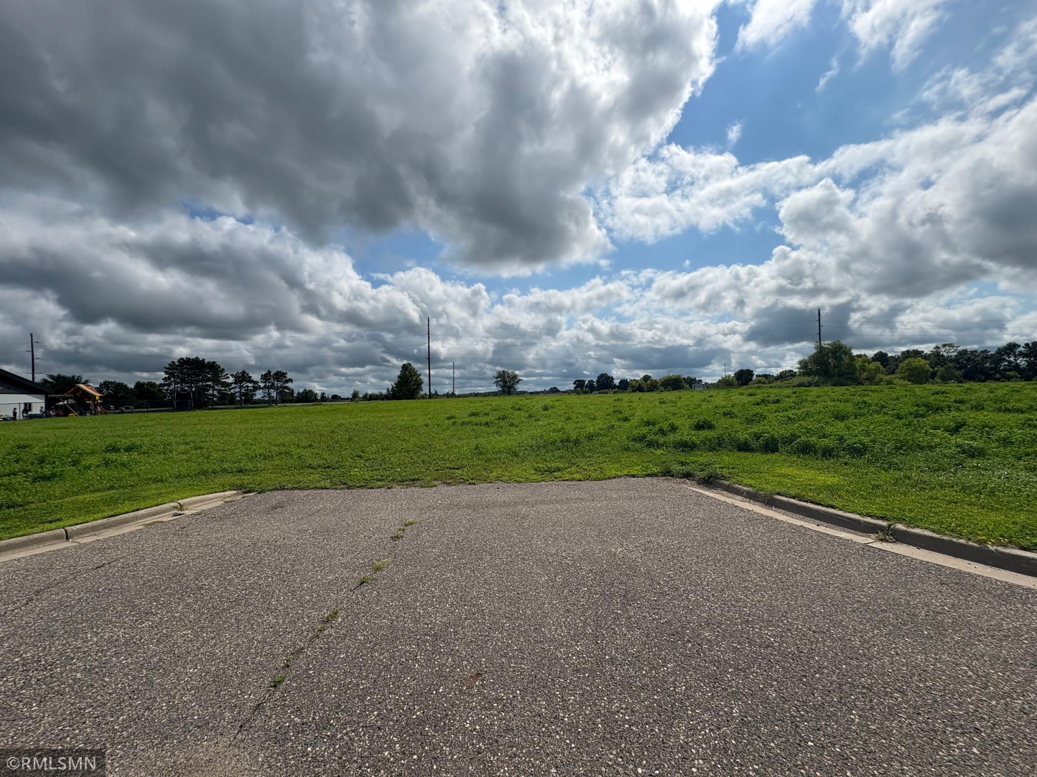 Here is the 2nd road approach to acreage. New daycare facility was just built next to the land.