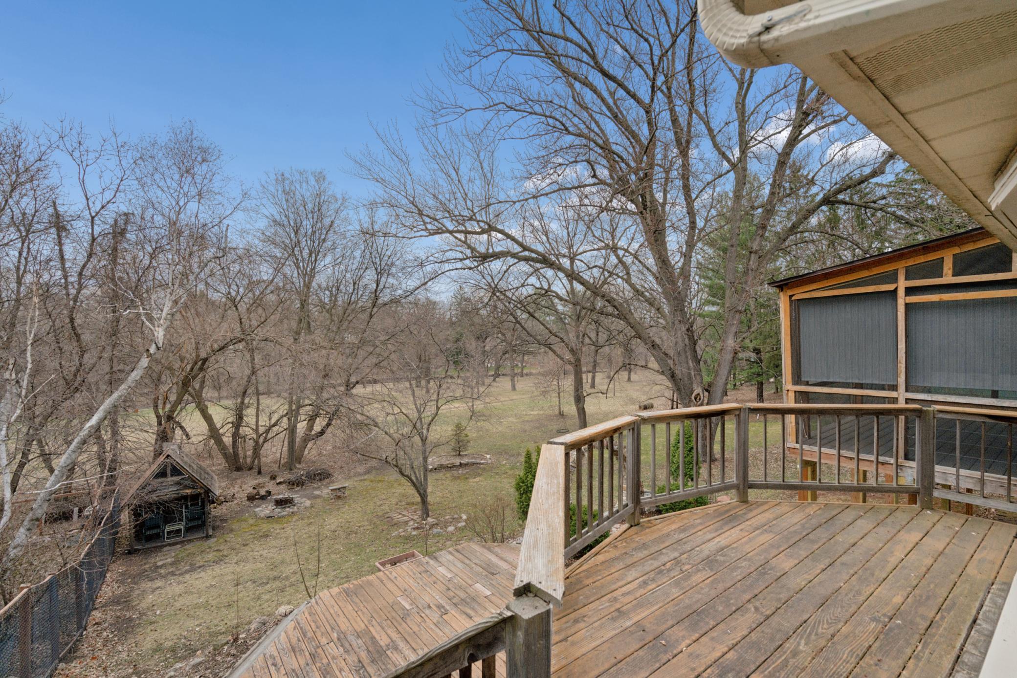 backing directly to park board land and the creek, offering a private, park-like setting that is nearly impossible to replicate.