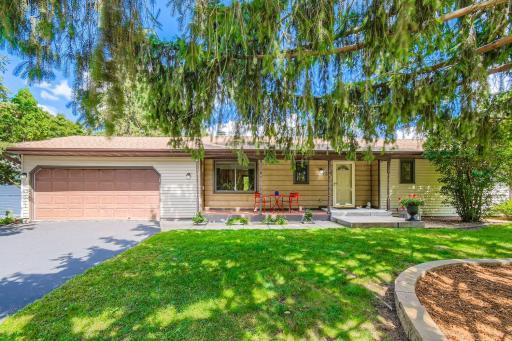 Charming rambler with lots of nice trees & perennial gardens