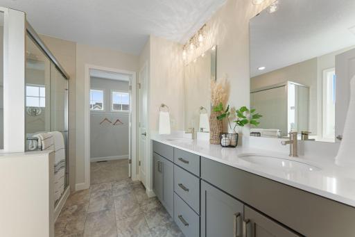 Owner's bathroom with painted vanity and double sinks