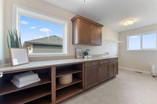 Oversized laundry room with loads of windows