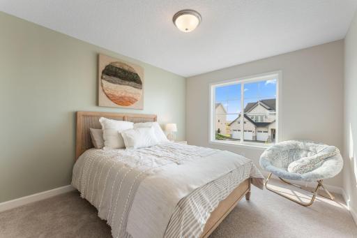 Upper level bedroom 2 with walk-in closet
