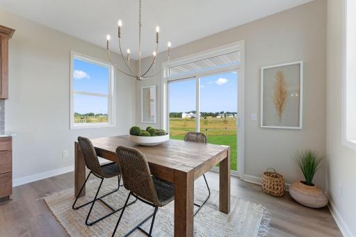 Eating area with sliding glass door to future deck