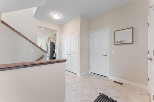 Great pantry storage tucked just outside the kitchen