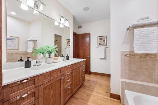 Primary bathroom blends luxury and comfort in every detail