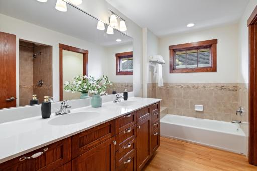 Spacious upper level full bathroom with timeless, clean design