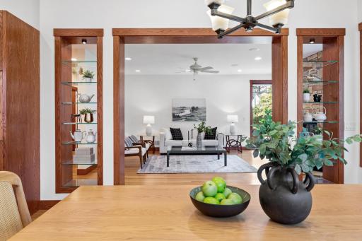 Perfectly framing the dining area, these shelves are an elegant setting to showcase your objets dâart and curated style