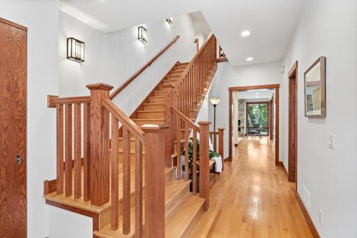A welcoming hallway draws you in from the front door to sweeping backyard views, blending openness with elegance