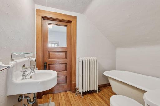 Full third floor bath with a nice office/7th bedroom just on the other side of that door