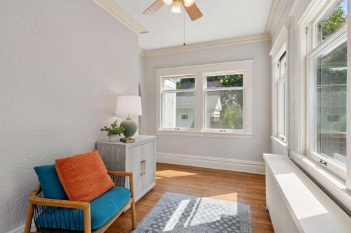 Inviting first floor sunroom could serve as a great office as well