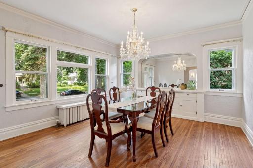 Formal dining room continues to display the charm of the era