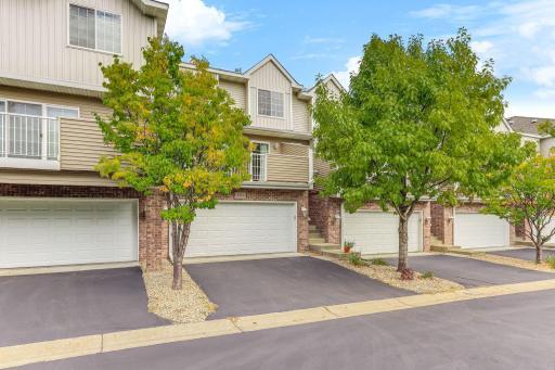 2714 Brockman Ct, Northfield - home is flanked by leafy trees on both sides of the spacious balcony.