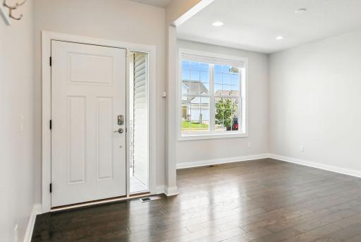Beatiful front entry opens up to the dining room.
