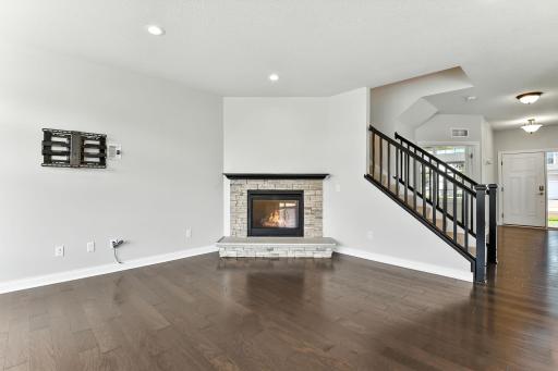 The gas fireplace creates a cozy atmosphere during the cooler months.
