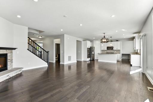 The floor color has a beautiful grey undertone that comes out in cooler light.