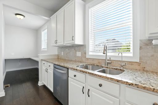 The unique floorplan offers a planning center off the kitchen